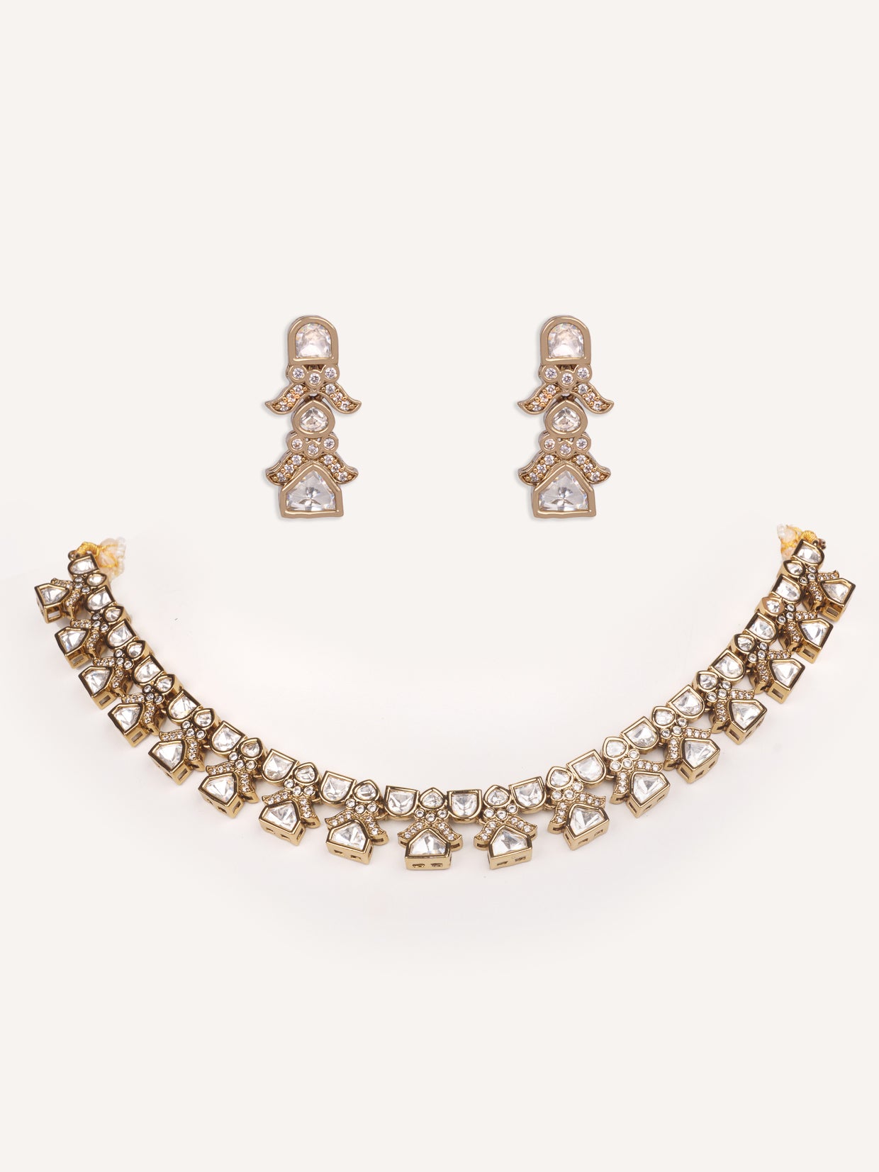 Dramatic and classy two tone kundan polki stone necklace set with matching earrings