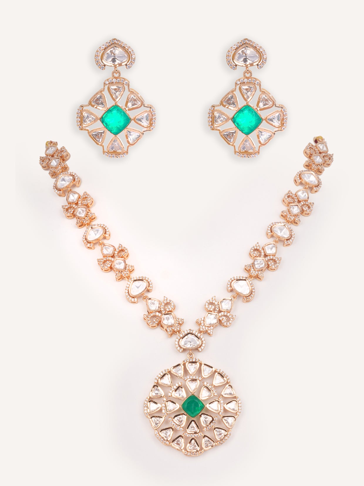 Elegant and stylish pendant necklace and earrings with green stone