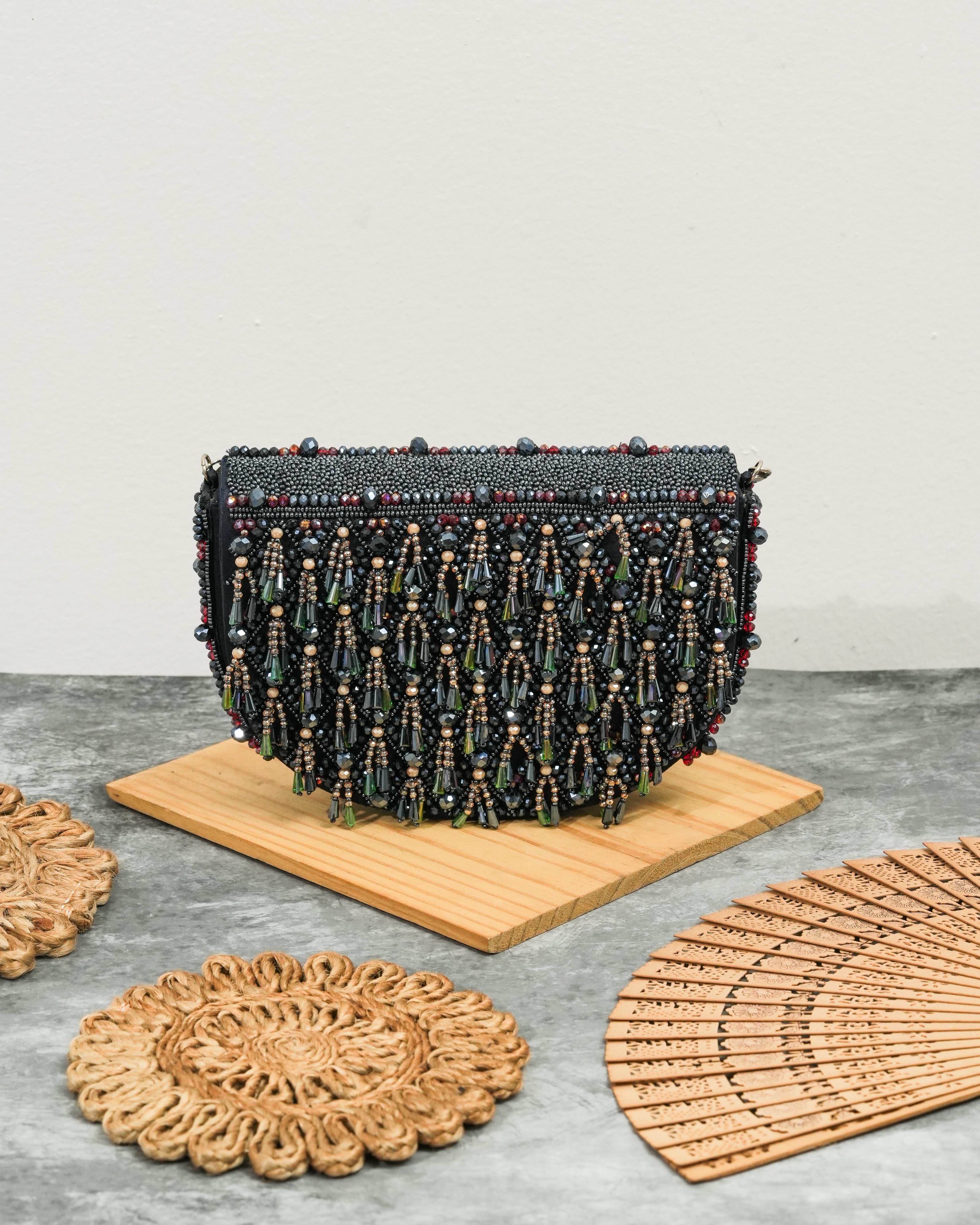 Semi circle tassle clutch