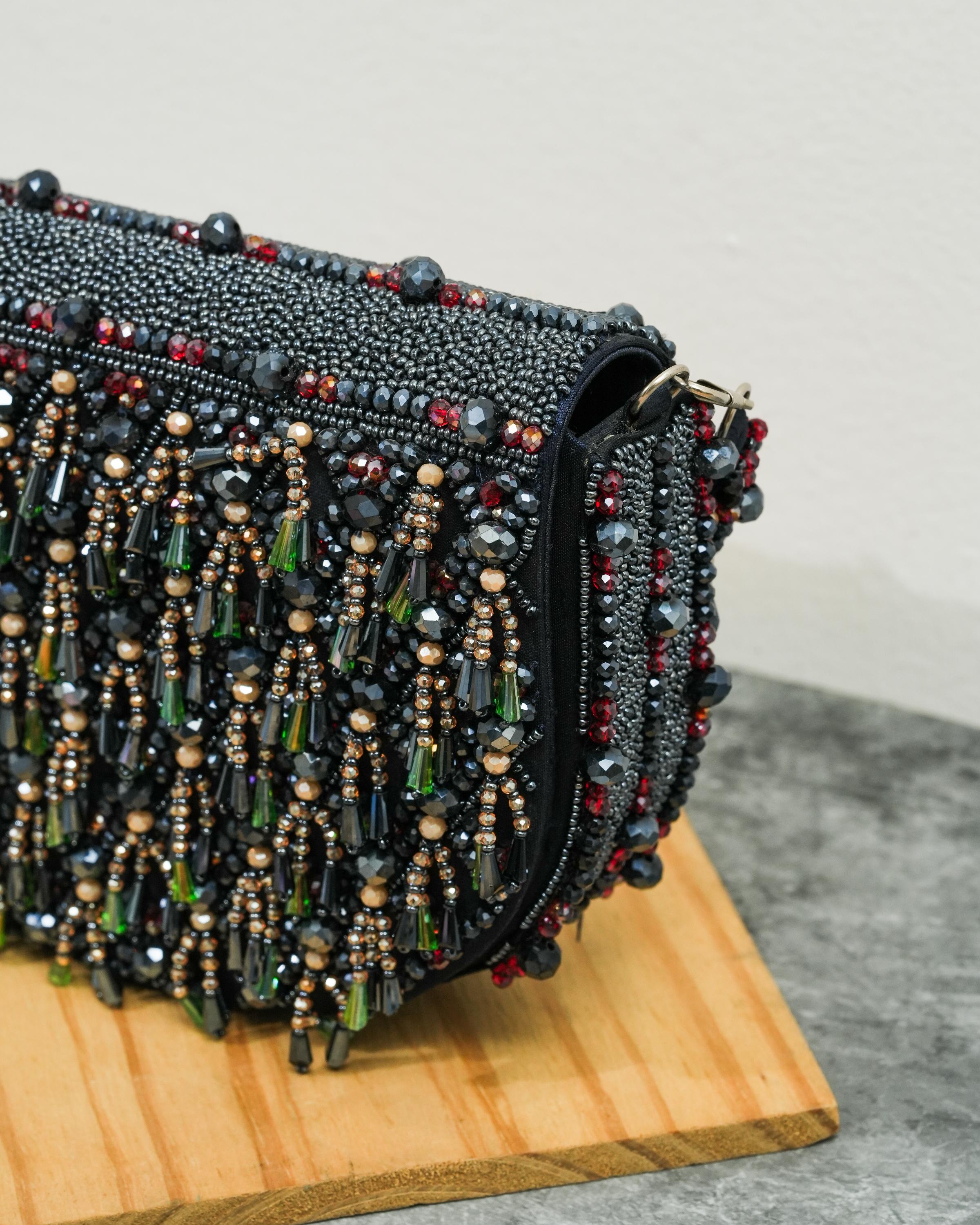 Semi circle tassle clutch