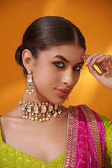 Bold and dramatic polki choker with matching earrings