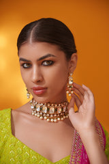Bold and dramatic polki choker with matching earrings
