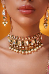 Bold and dramatic polki choker with matching earrings
