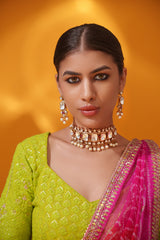 Bold and dramatic polki choker with matching earrings