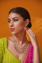 Bold and dramatic 3- line kundan necklace with earrings