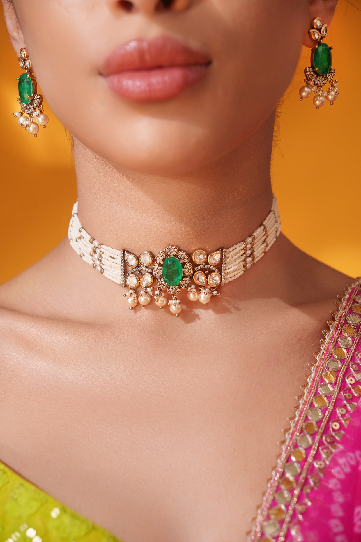 Dramatic and classy two tone kundan choker with matching earrings