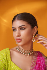 Dramatic and classy two tone kundan polki stone necklace set with matching earrings