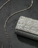 S for Silver clutch