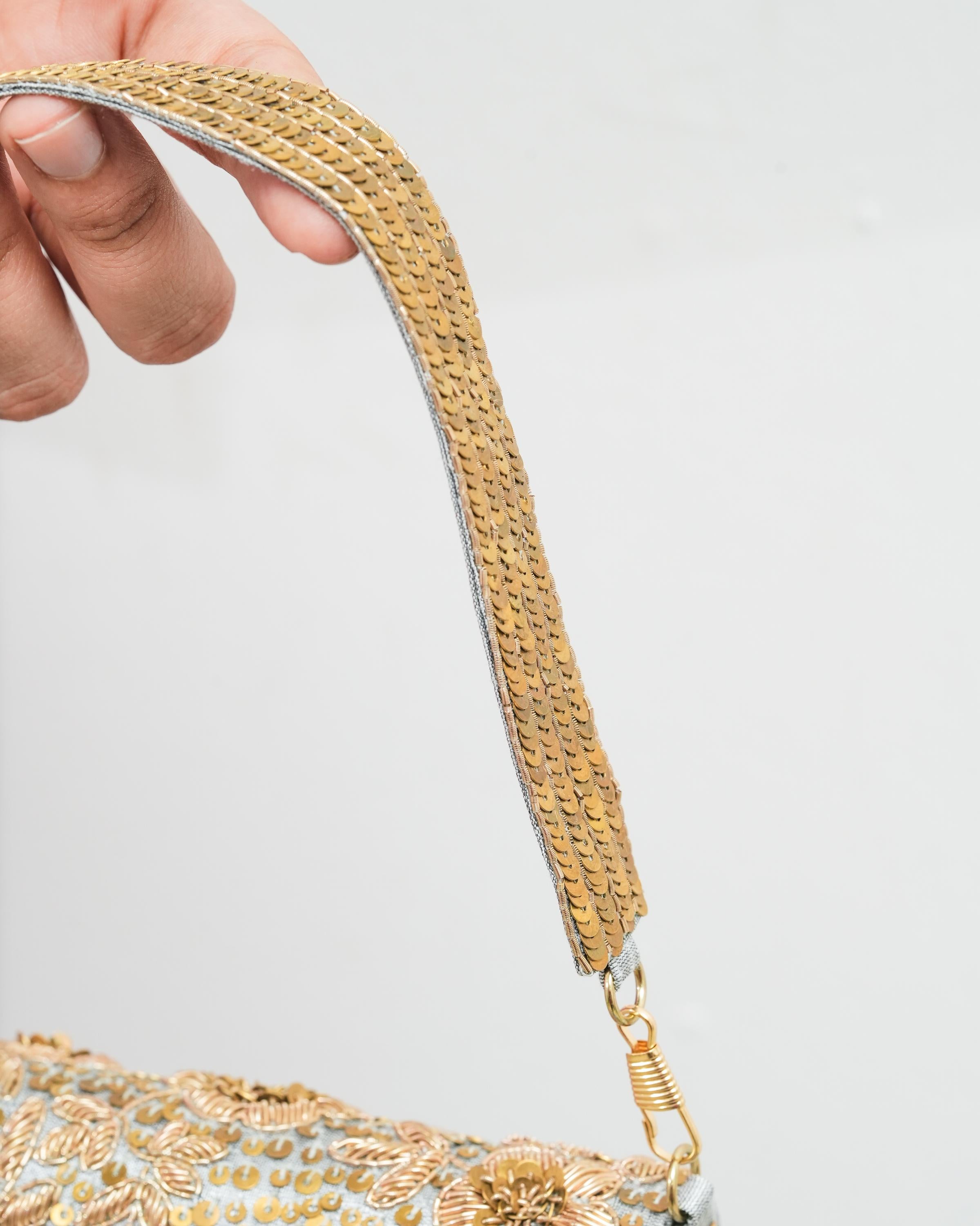 Golden silver flower clutch