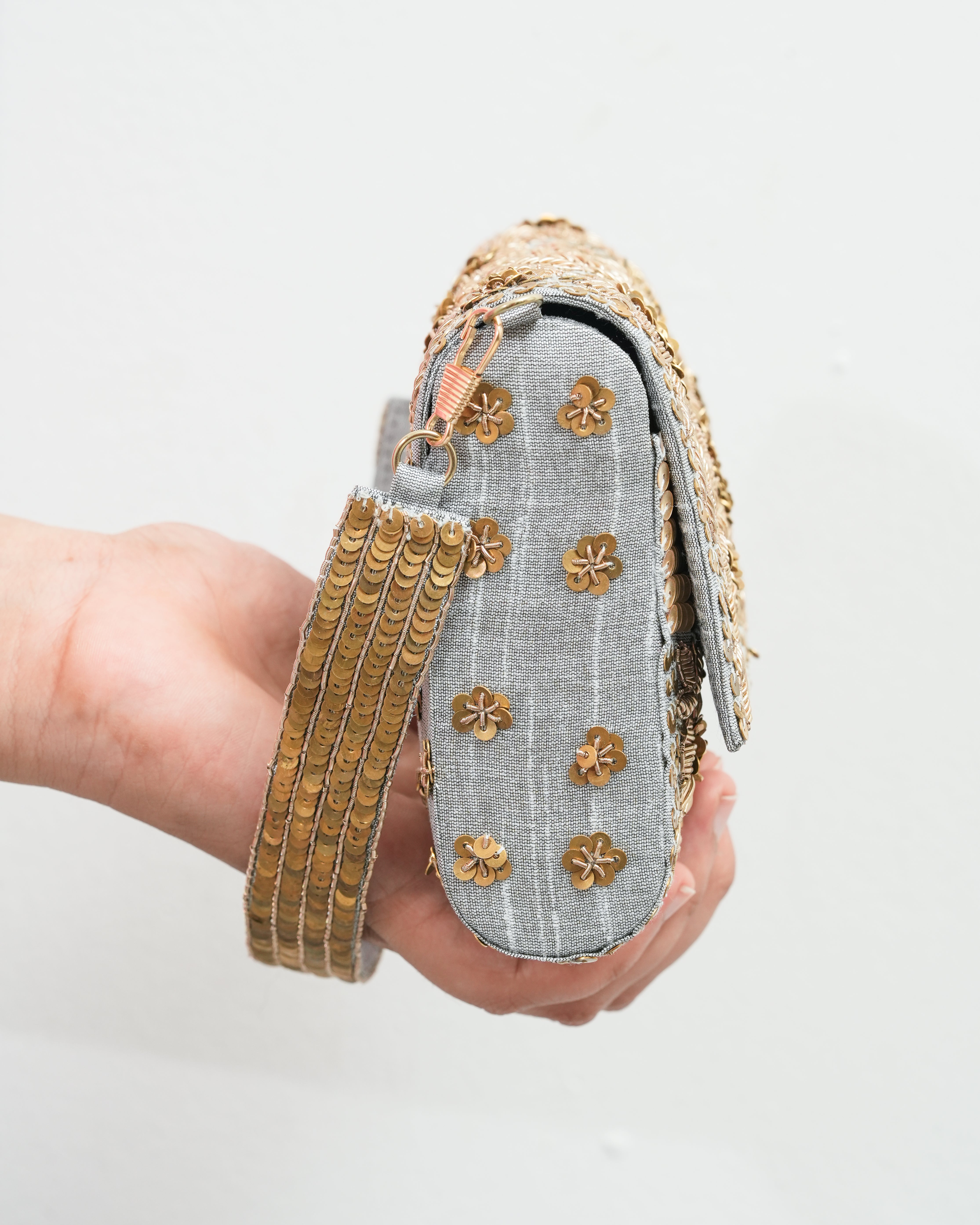 Golden silver flower clutch