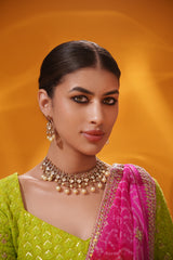 Dramatic and classy two tone kundan polki stone necklace set with matching earrings