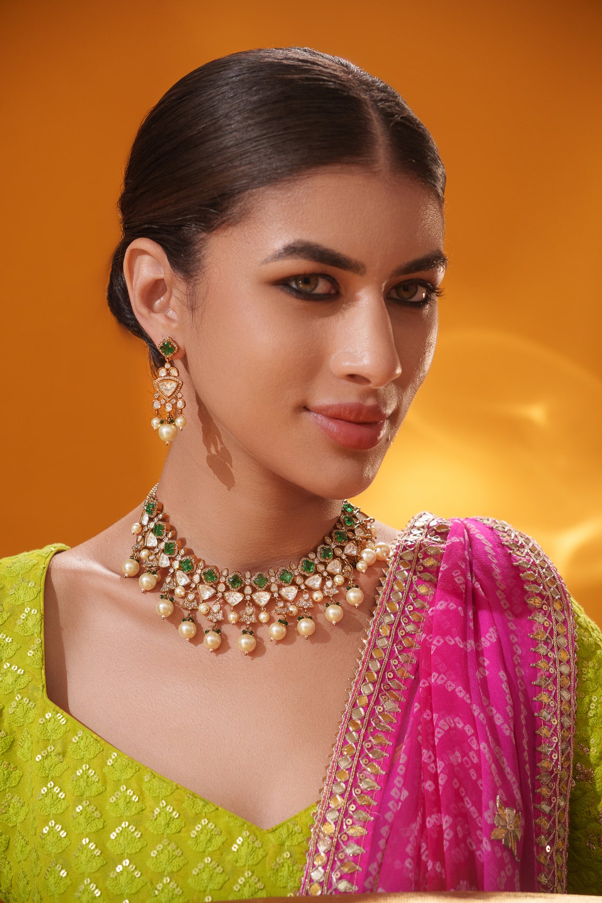Dramatic and classy two tone kundan polki stone necklace set with matching earrings