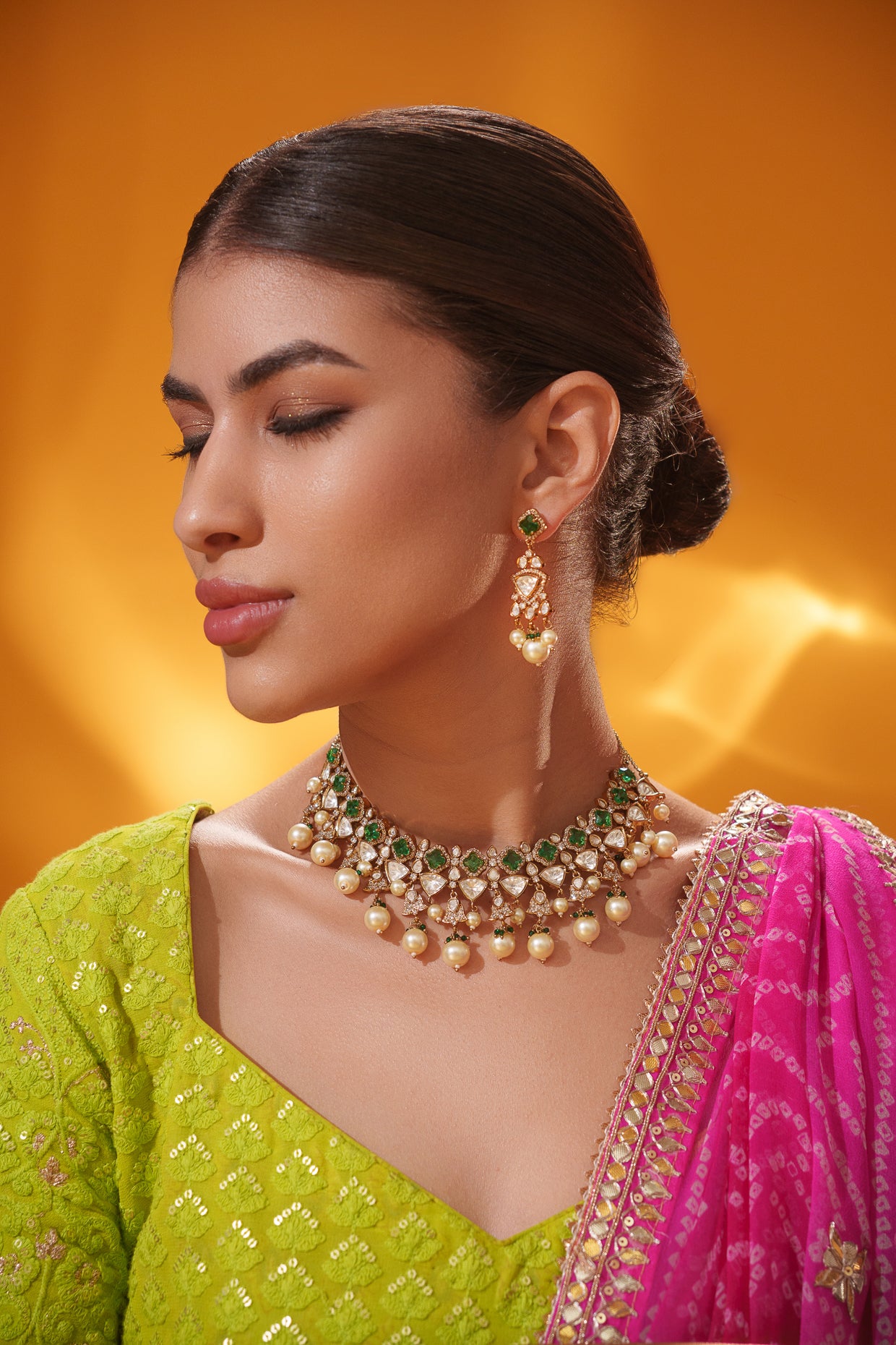 Dramatic and classy two tone kundan polki stone necklace set with matching earrings