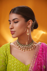 Dramatic and classy two tone kundan polki stone necklace set with matching earrings