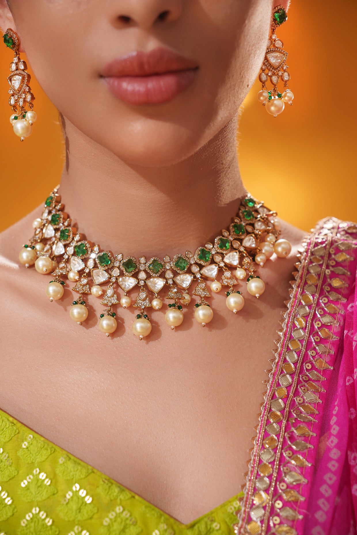 Dramatic and classy two tone kundan polki stone necklace set with matching earrings