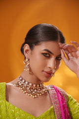 Dramatic and classy two tone kundan polki stone necklace set with matching earrings