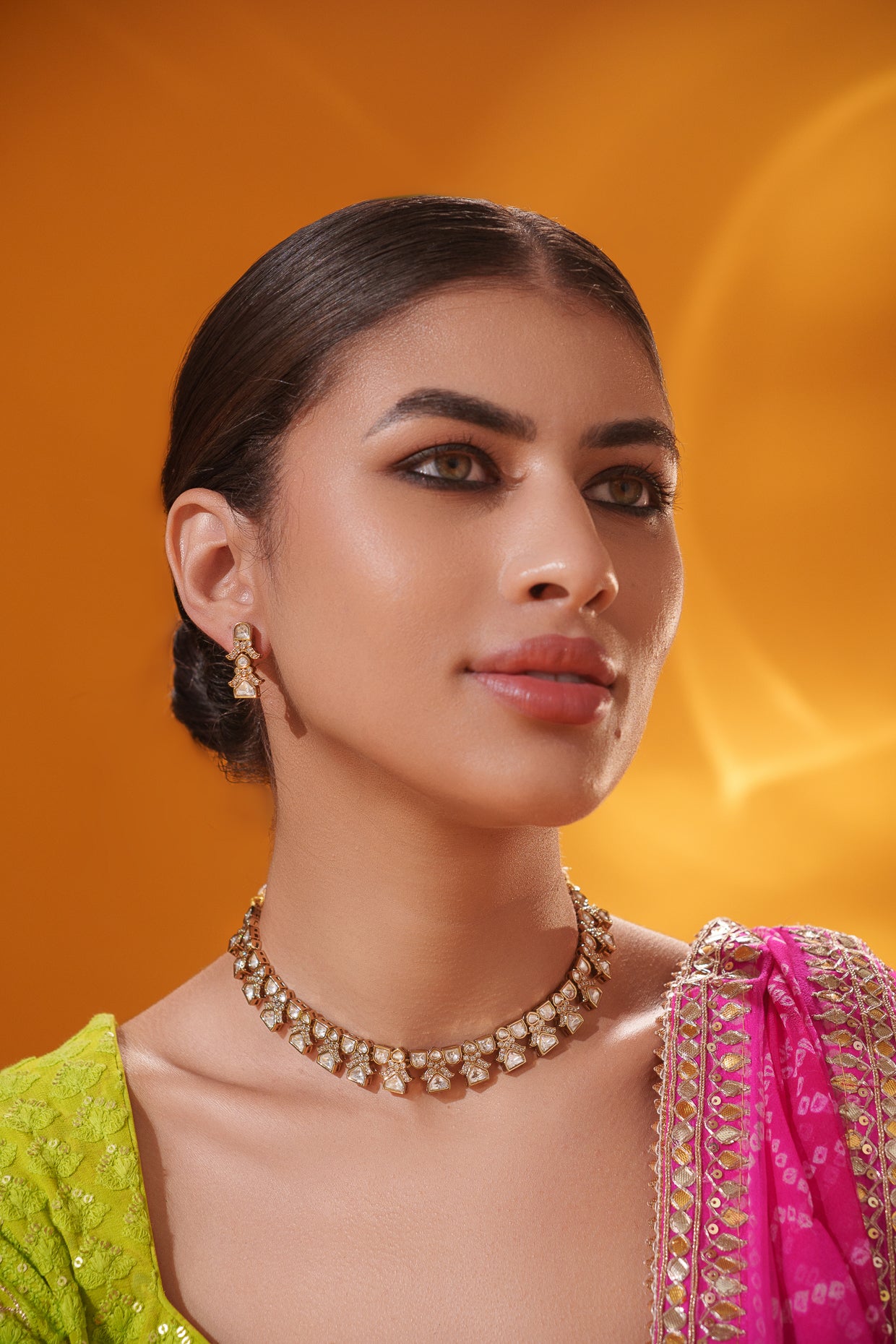 Dramatic and classy two tone kundan polki stone necklace set with matching earrings