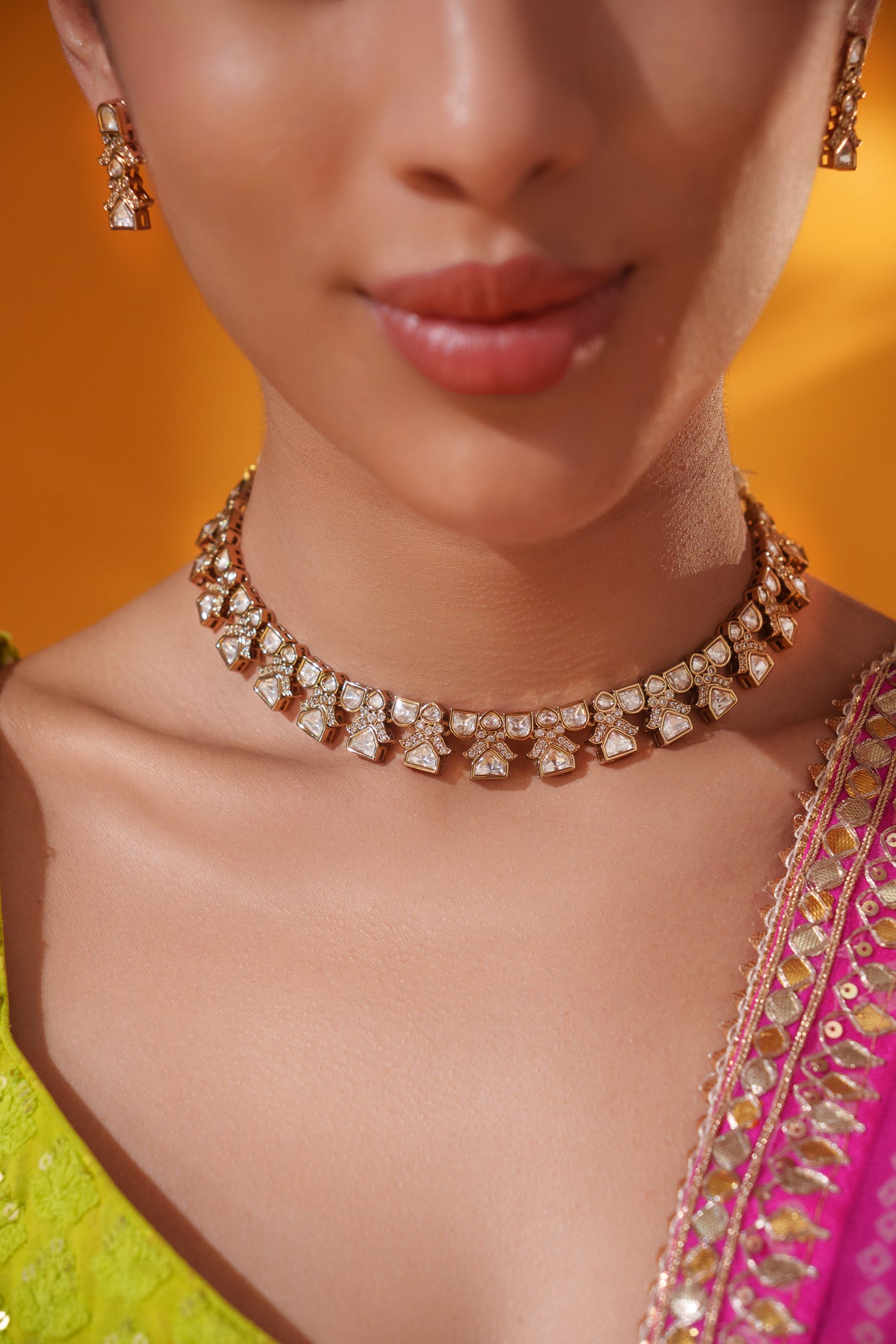 Dramatic and classy two tone kundan polki stone necklace set with matching earrings