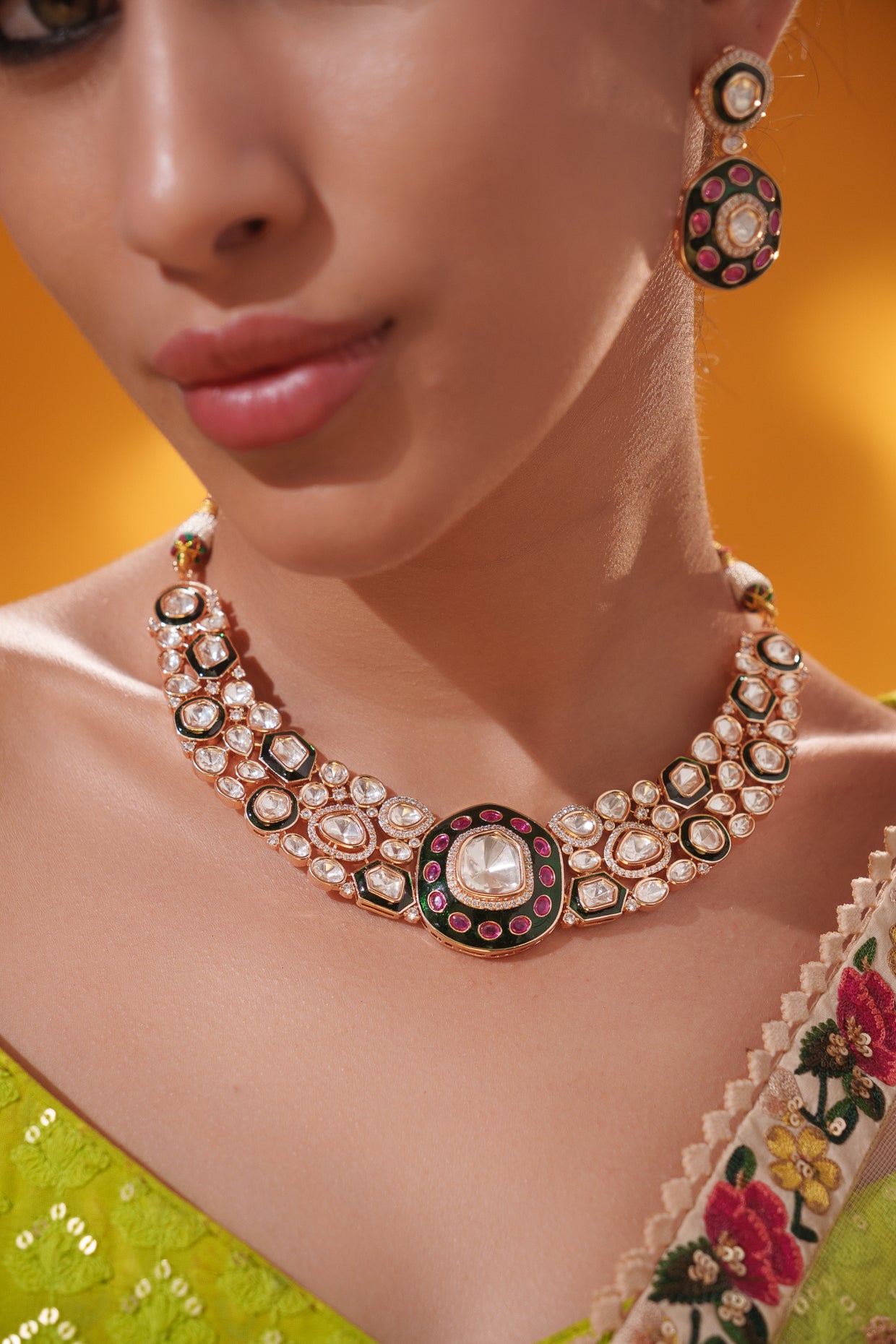 Classy kundan meena necklace set with elegant pair of earrings.