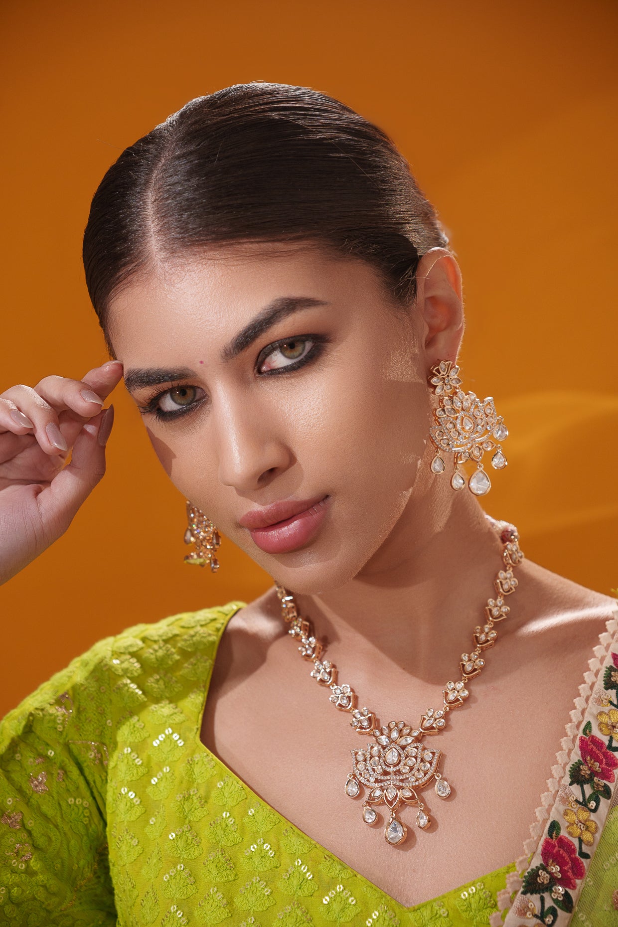 Stylish and classic kundan necklace set with matching earrings
