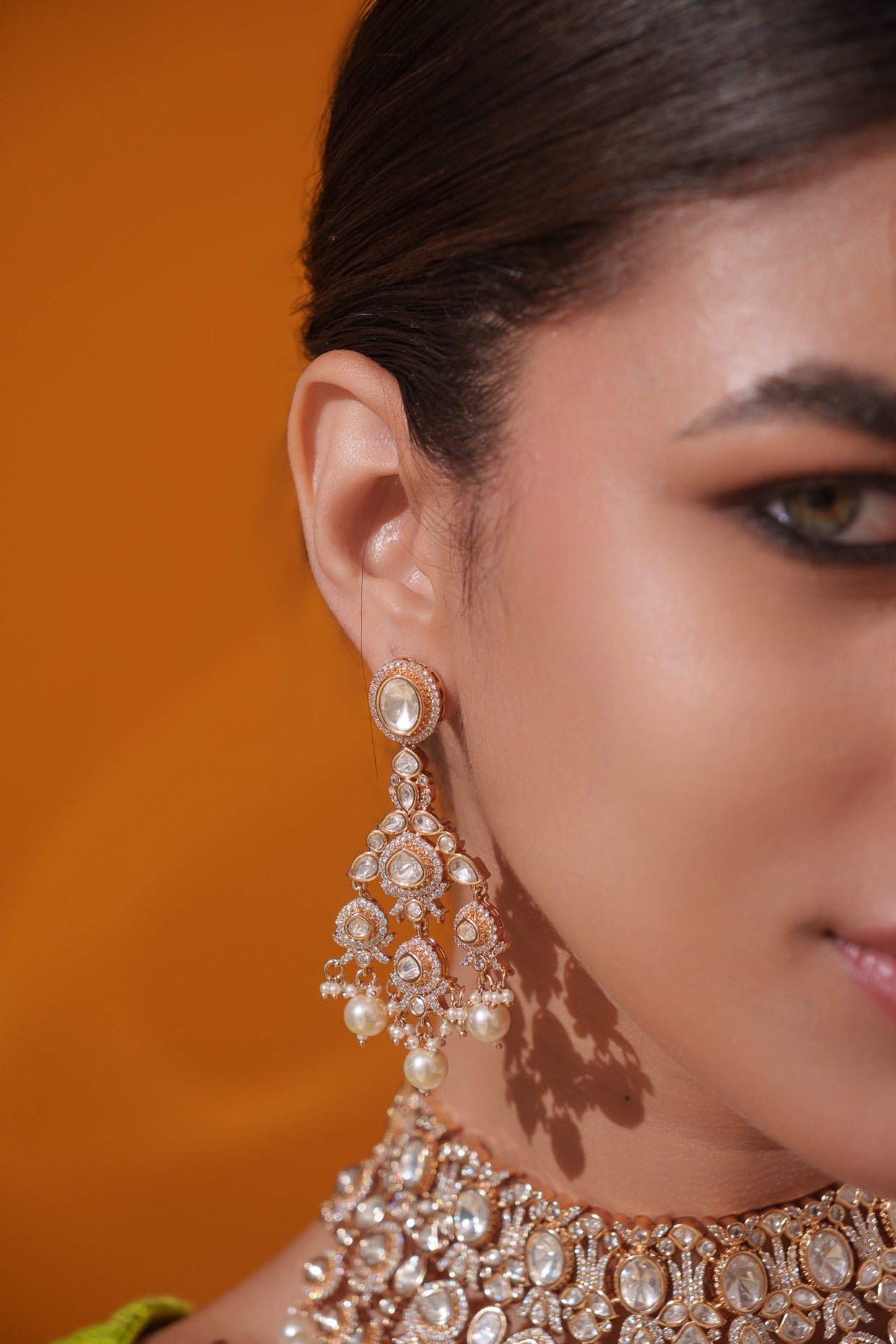 Traditional yet dramatic kundan necklace set with matching earrings and maangtika