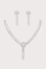 Delicate yet elegant diamond pendant necklace with matching earrings