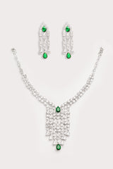 Elegant and sleek diamond pendant set with emerald stone and earrings