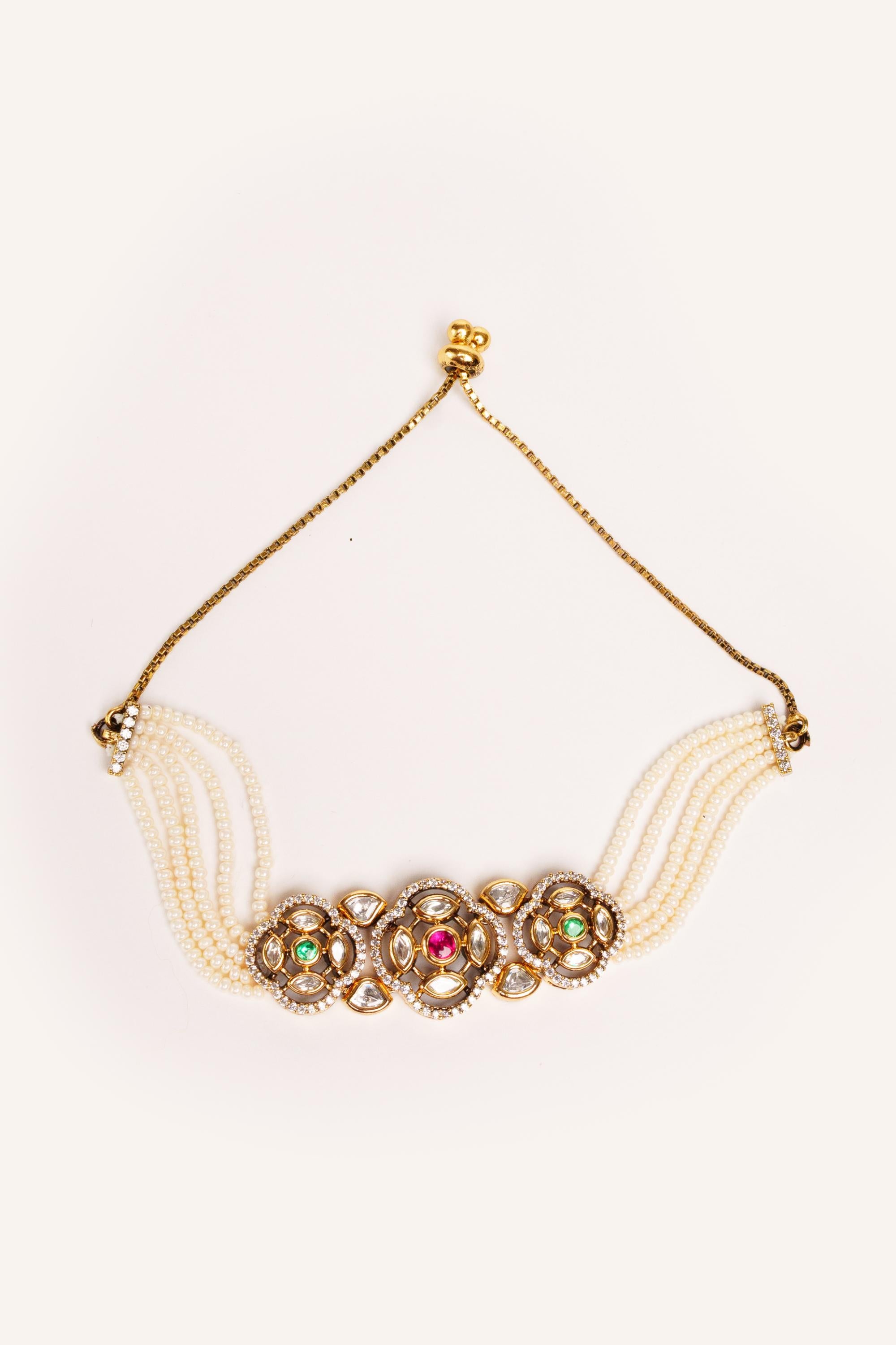 Classy and stylish kundan bracelet with navratan stones