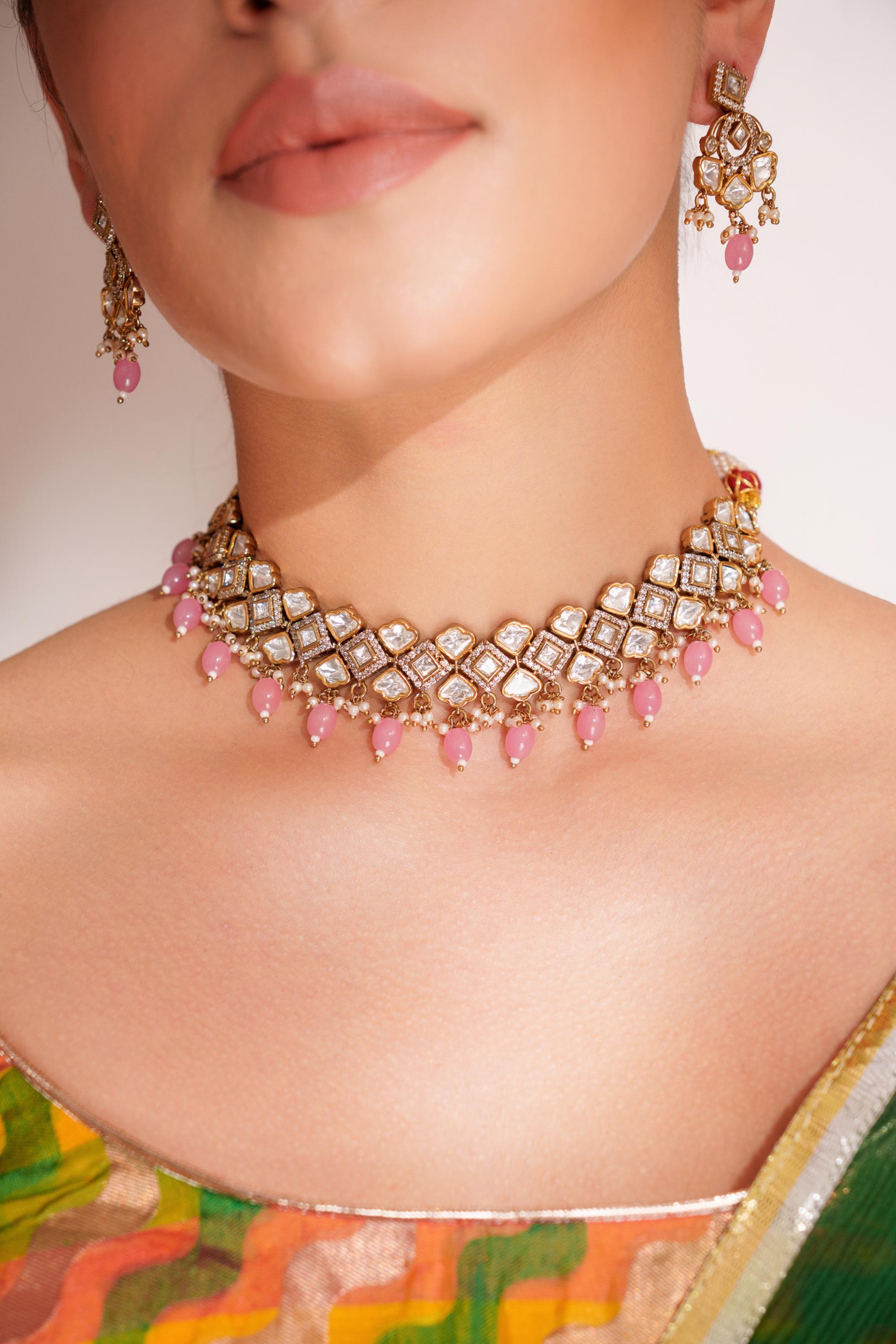 Dramatic and stylish kundan necklace set with matching earrings