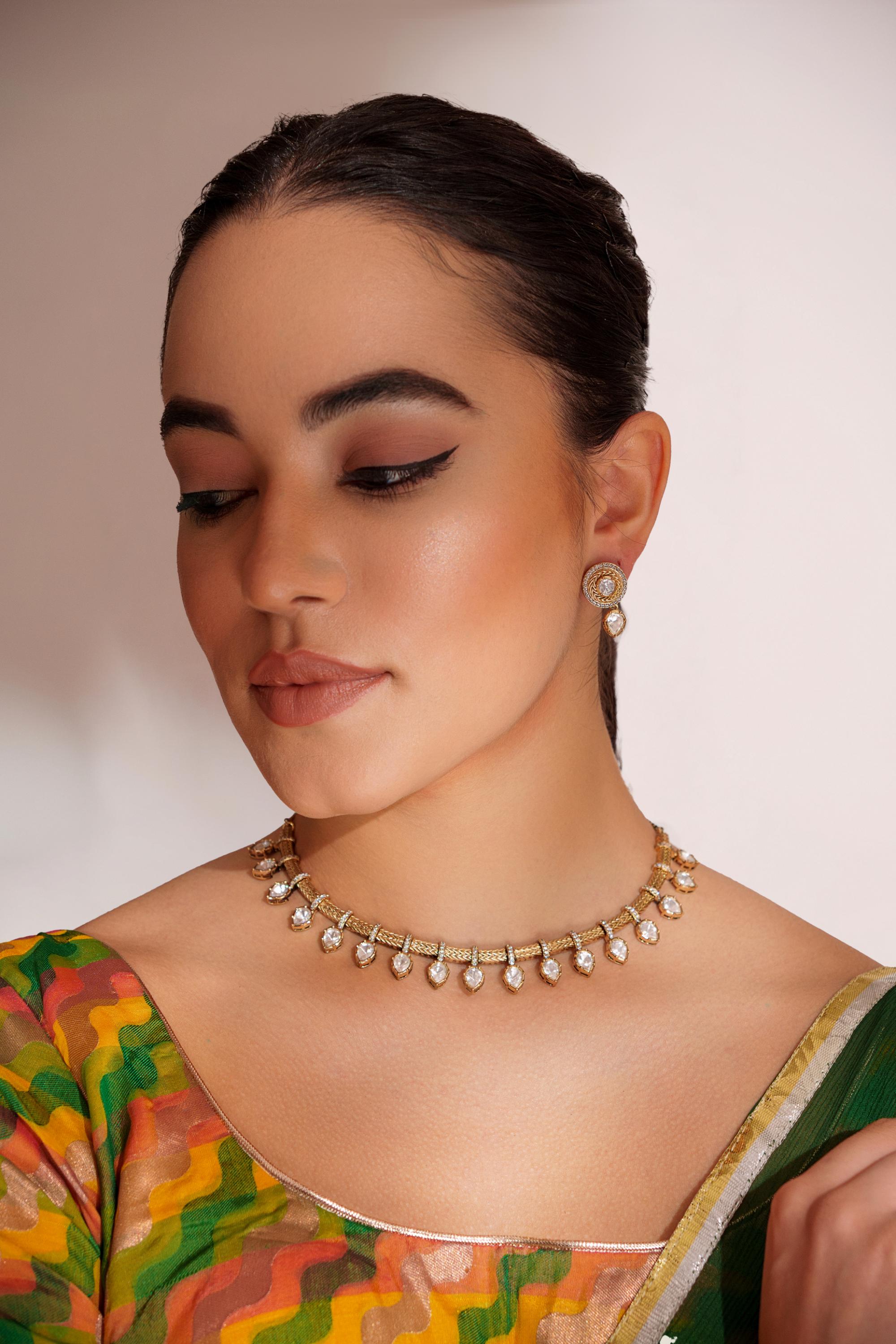 Dramatic and stylish kundan necklace set with matching earrings