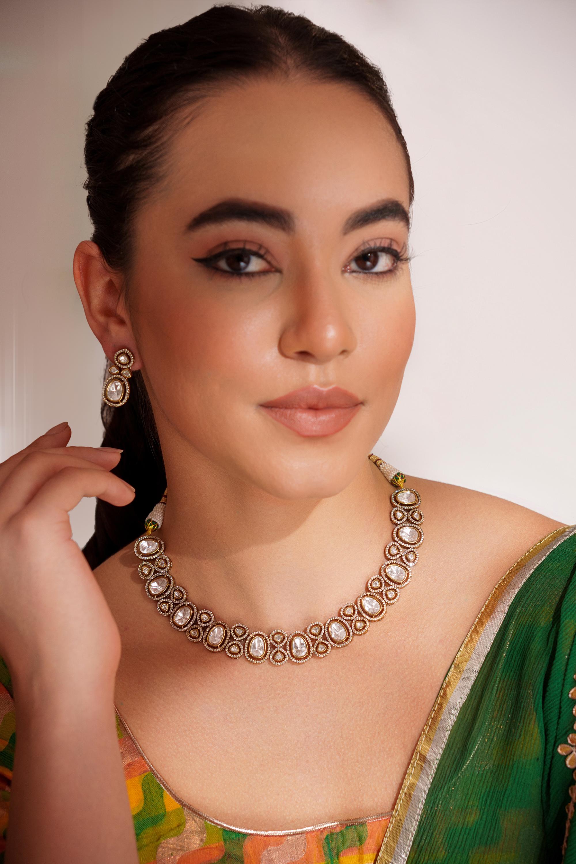Elegant and stylish zircon stone necklace set with matching earrings