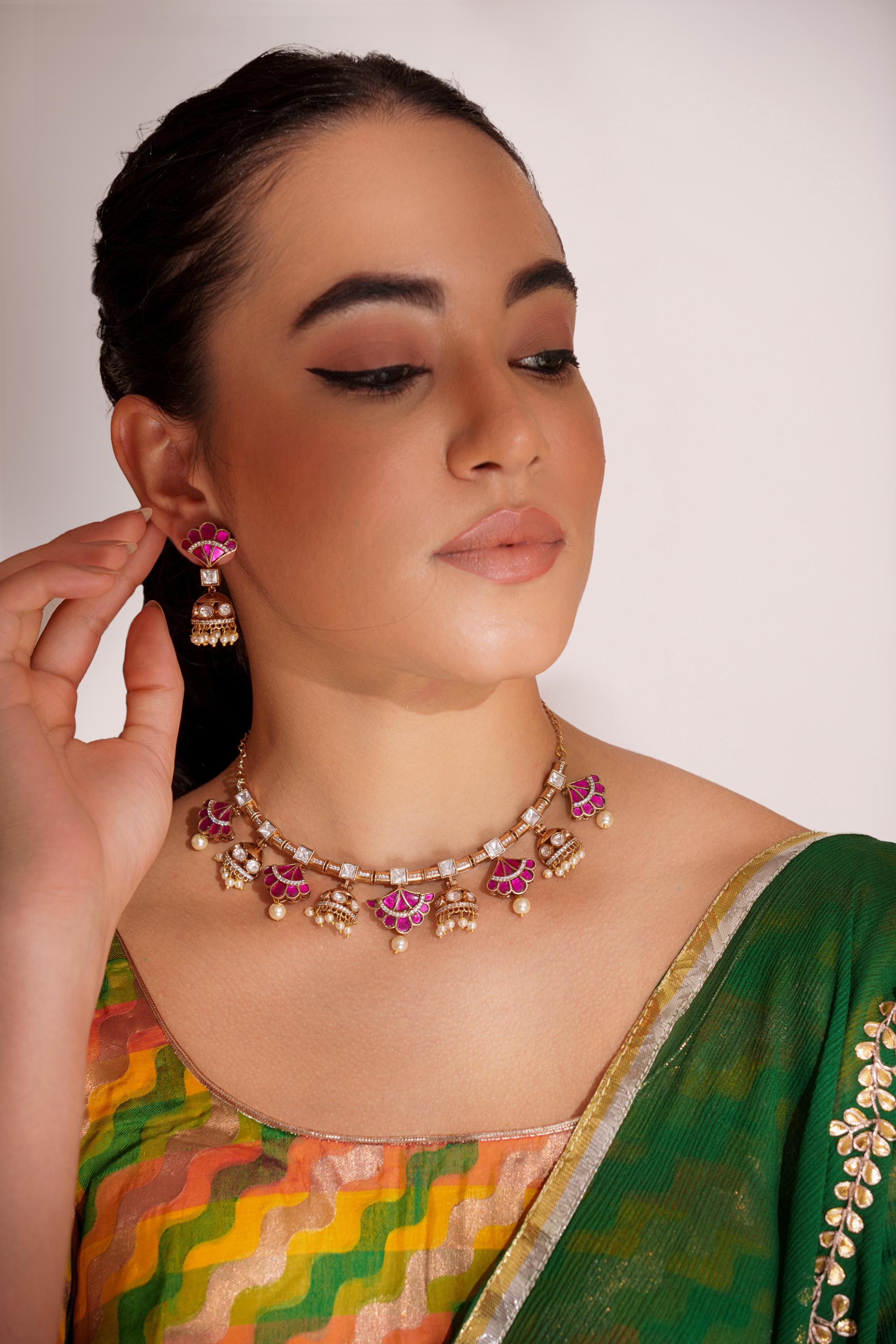 Elegant and stylish gold finish kundan polki necklace set