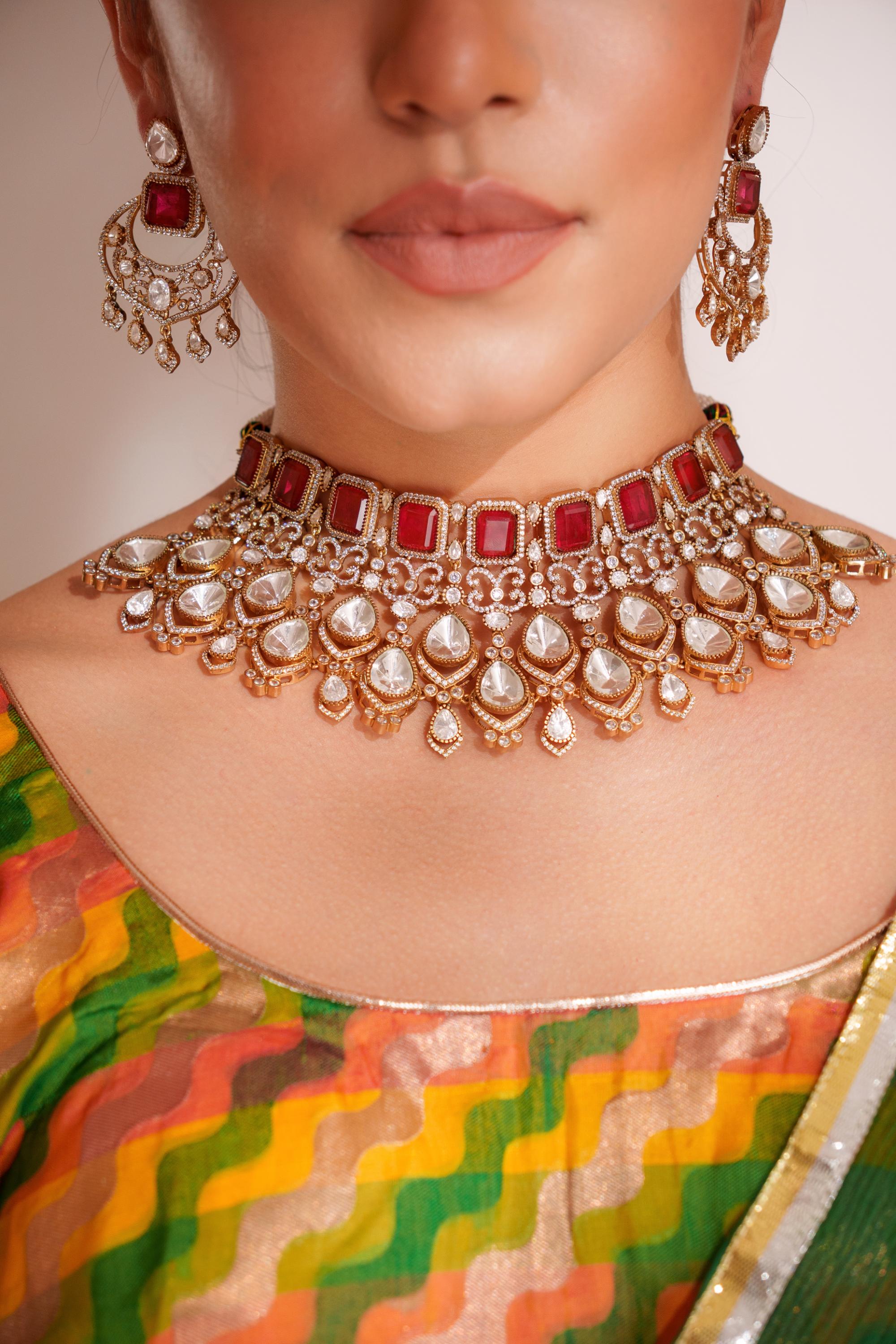 Bold and dramatic kundan necklace with earrings and maangtikka