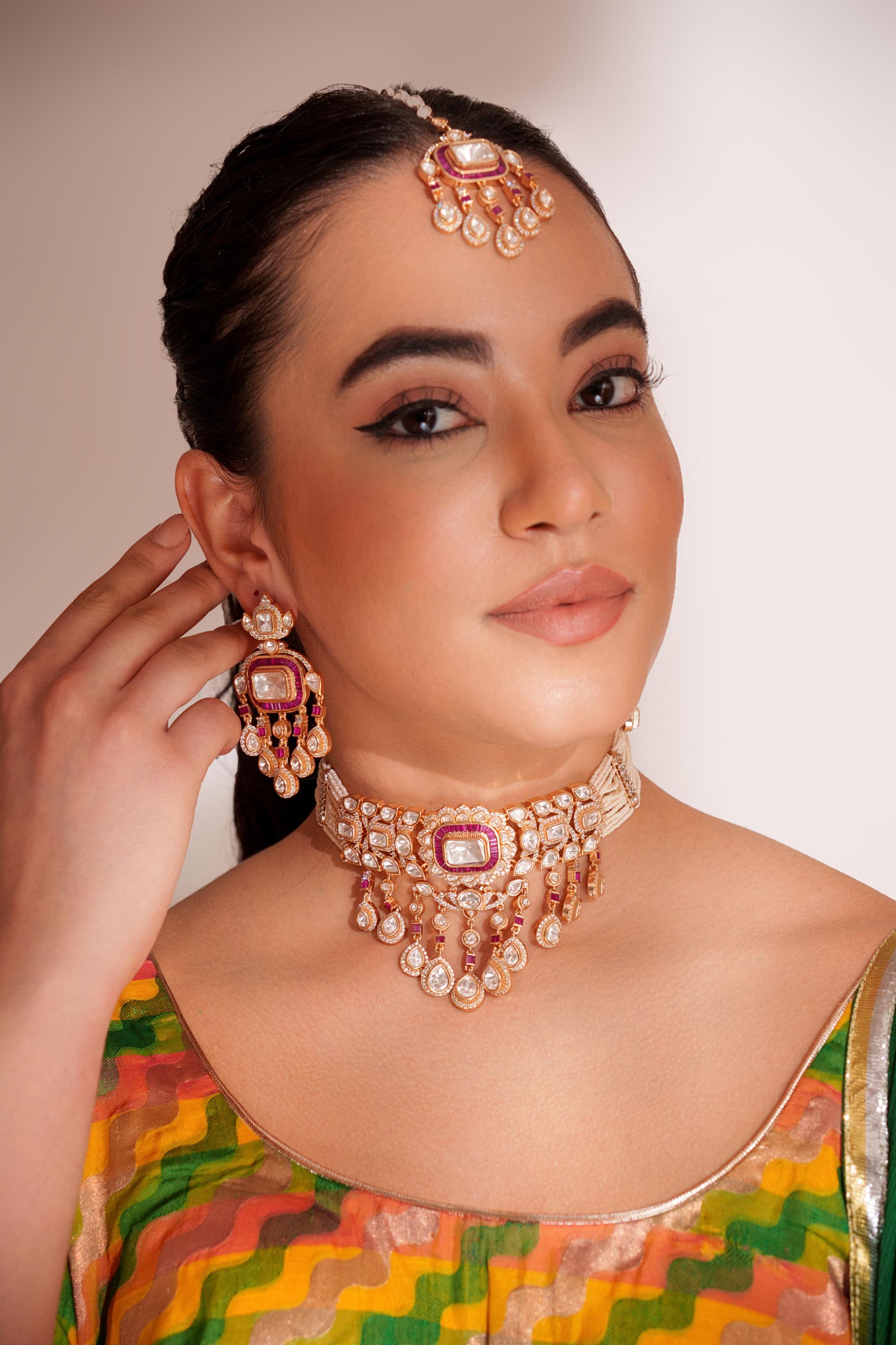 Bold and dramatic two tone finish polki choker set