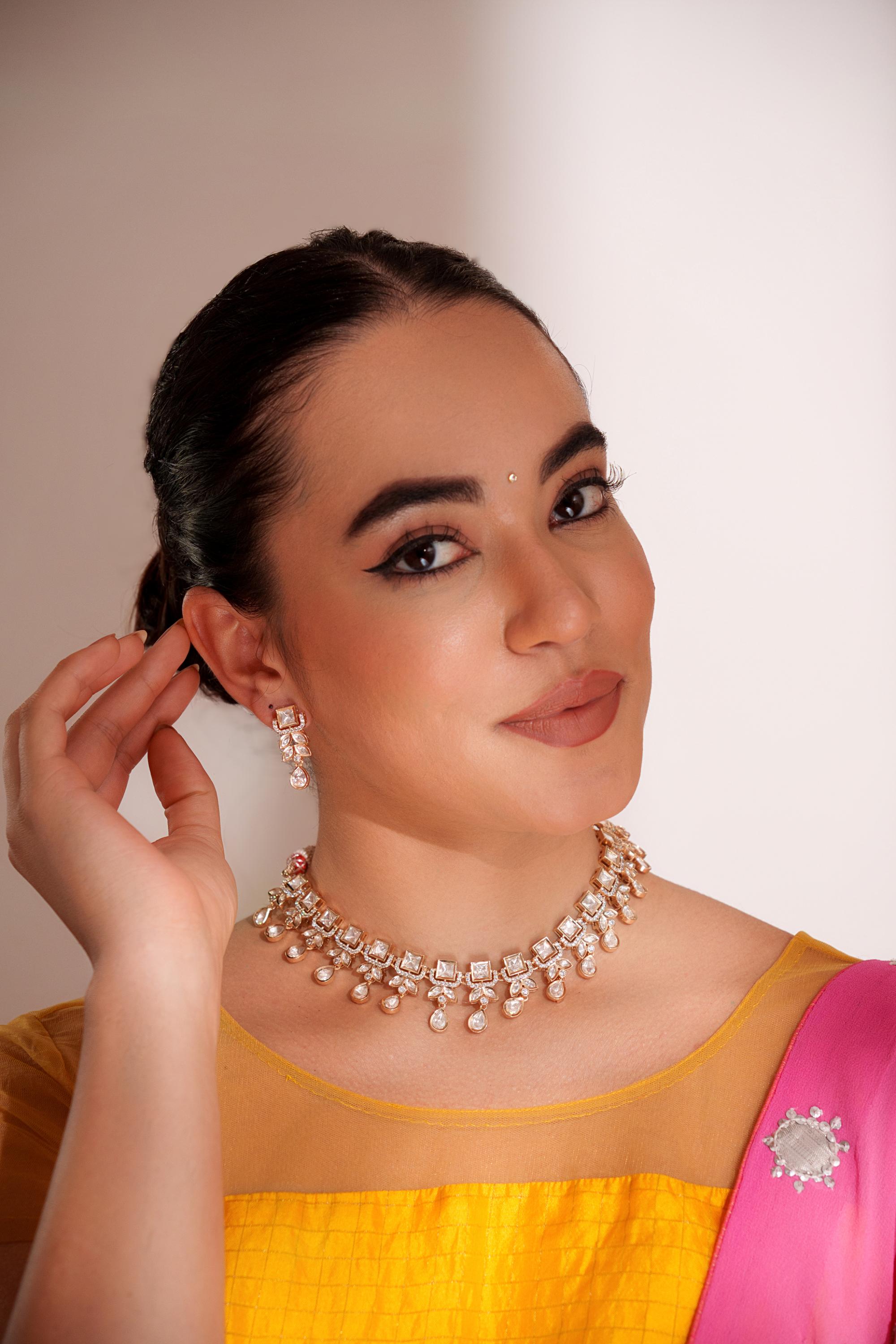 Dramatic and stylish kundan necklace set with matching earrings