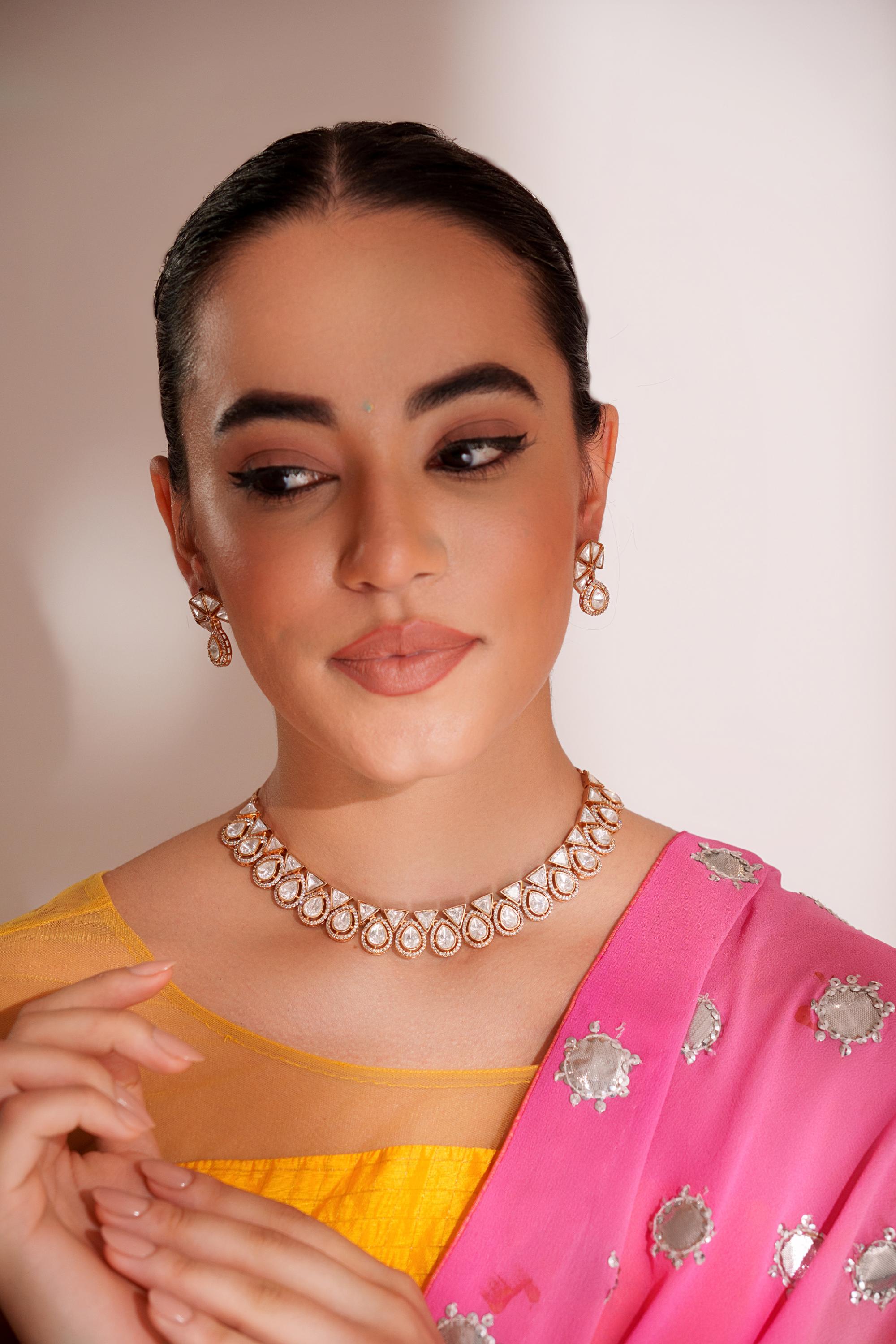 Elegant and stylish gold finish kundan polki necklace set