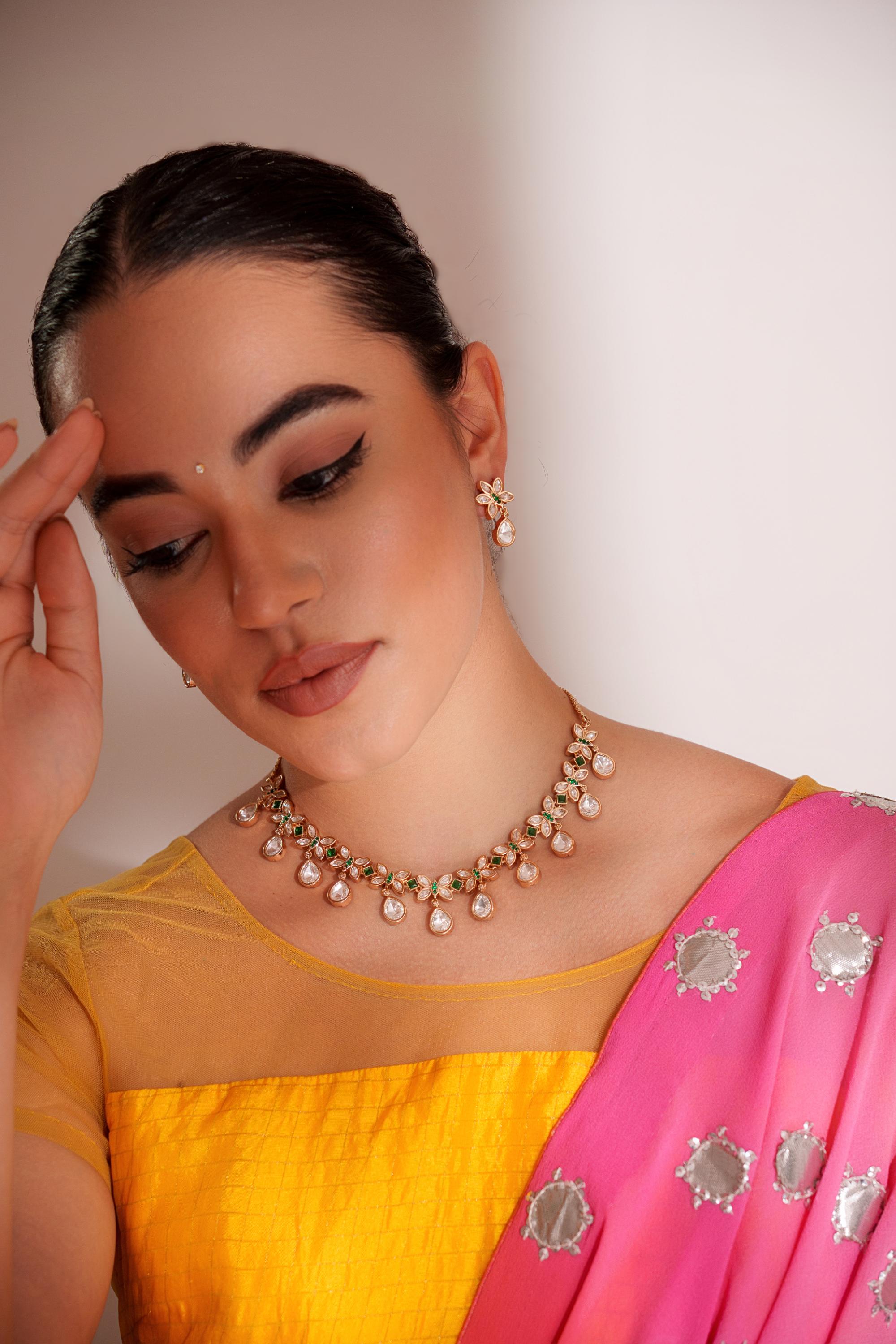 Dramatic and stylish kundan necklace set with matching earrings