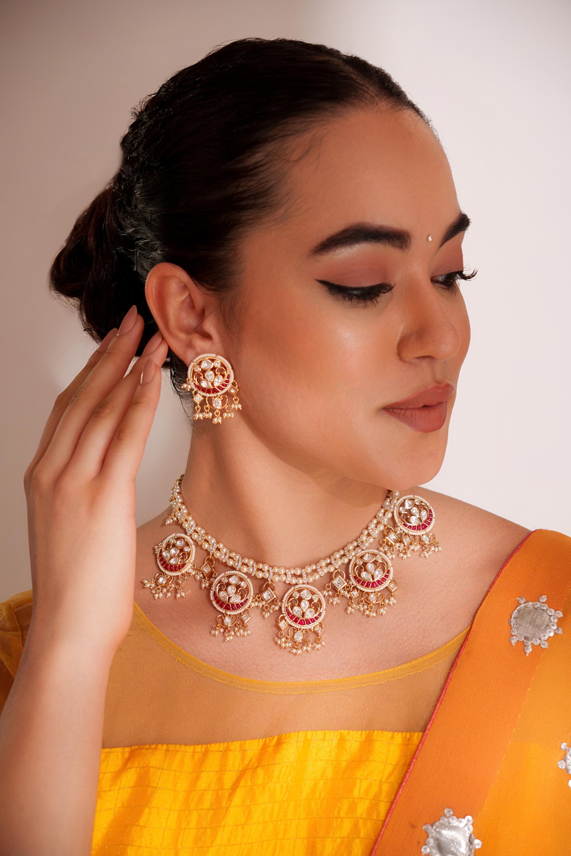 Elegant and stylish gold finish kundan polki necklace set