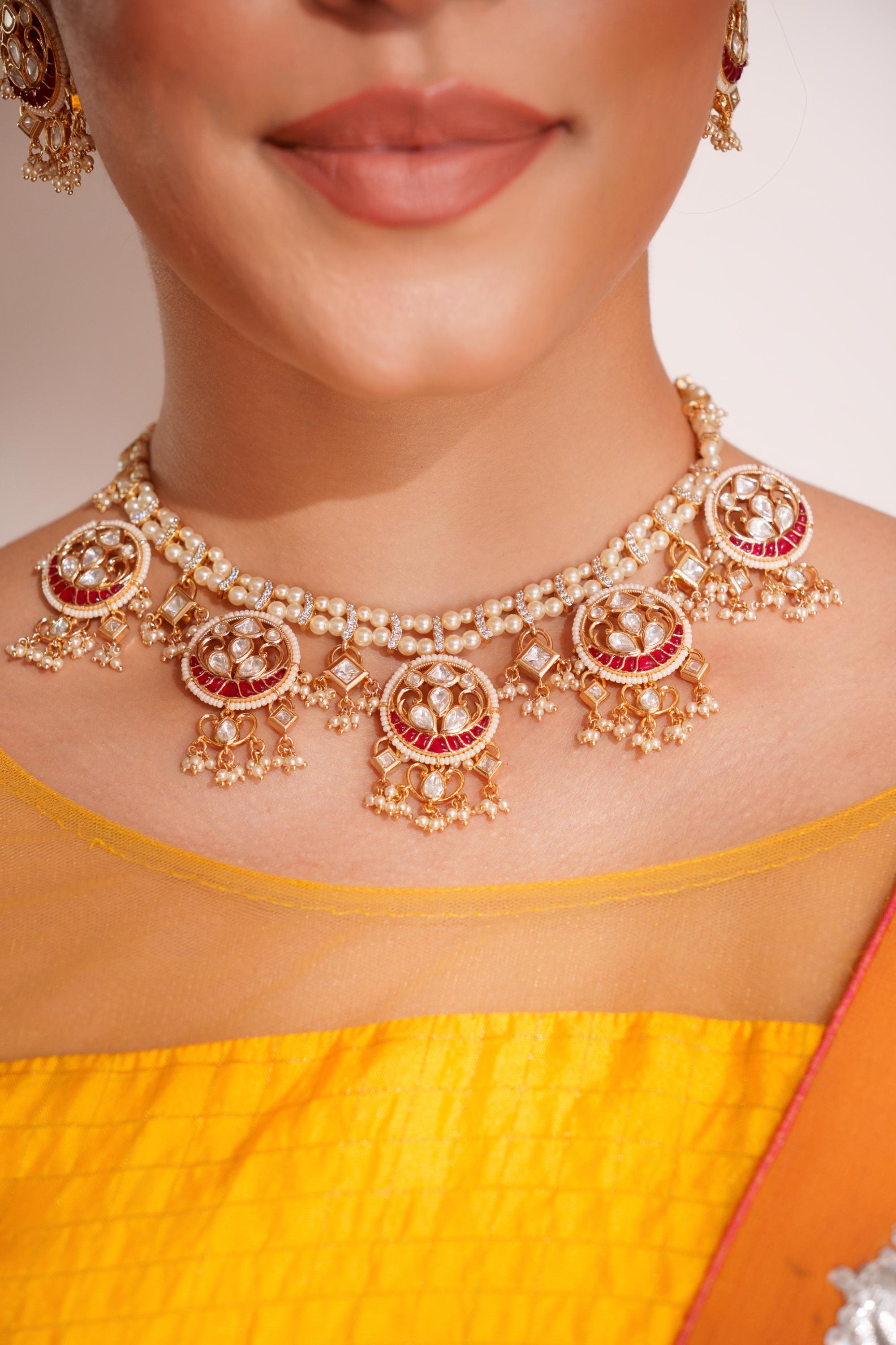 Elegant and stylish gold finish kundan polki necklace set