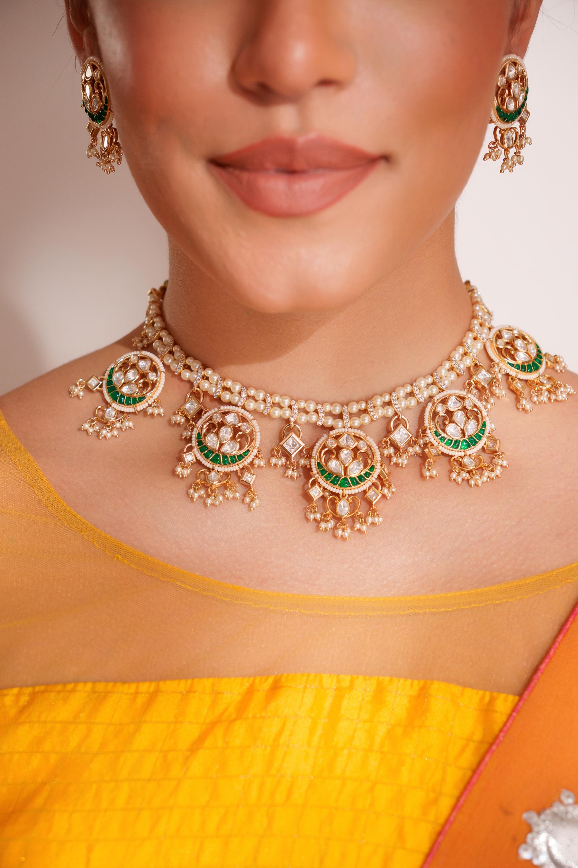 Elegant and stylish gold finish kundan polki necklace set