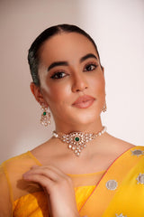 Classy kundan choker set with elegant pair of earrings