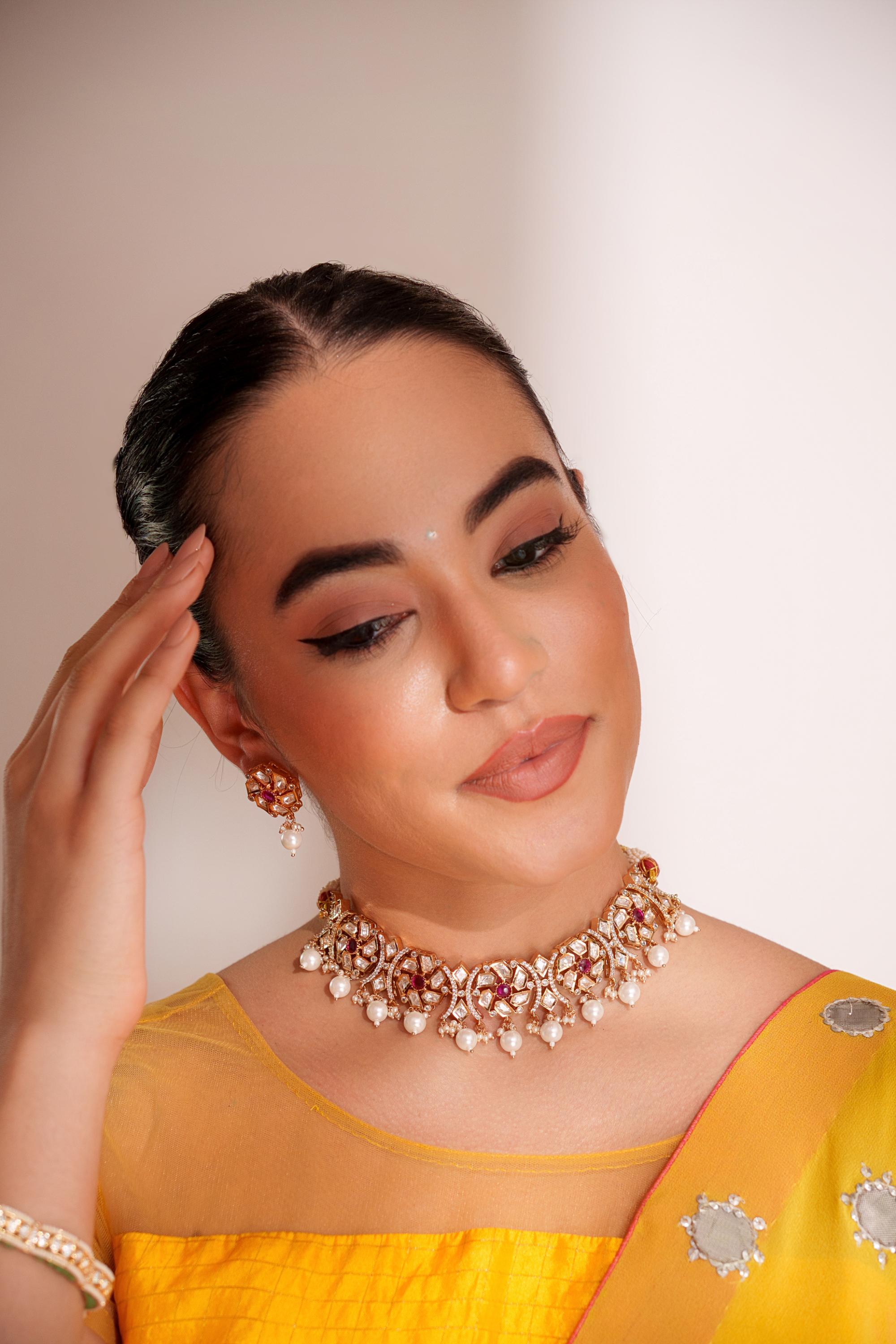 Dramatic and stylish kundan necklace set with matching earrings