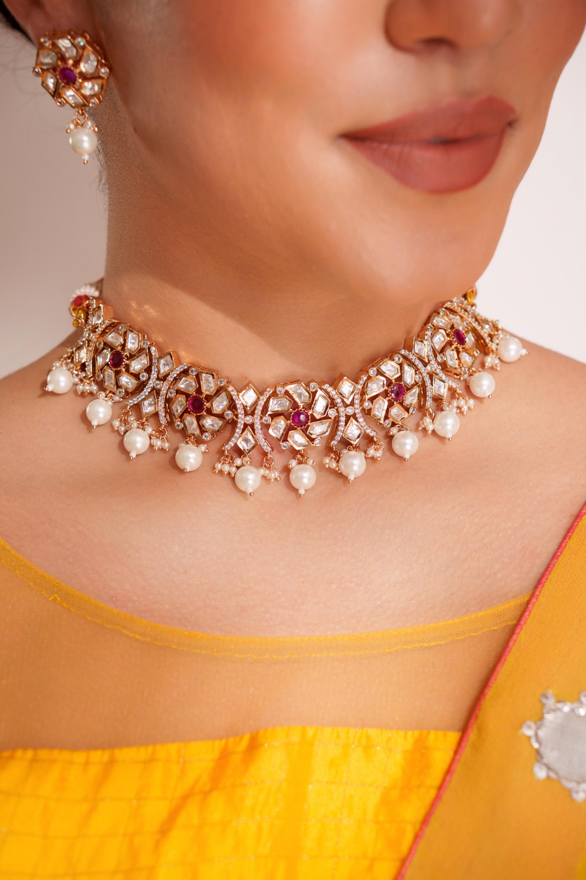 Dramatic and stylish kundan necklace set with matching earrings
