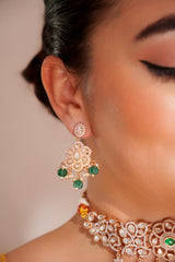 Classy kundan choker set with elegant pair of earrings.