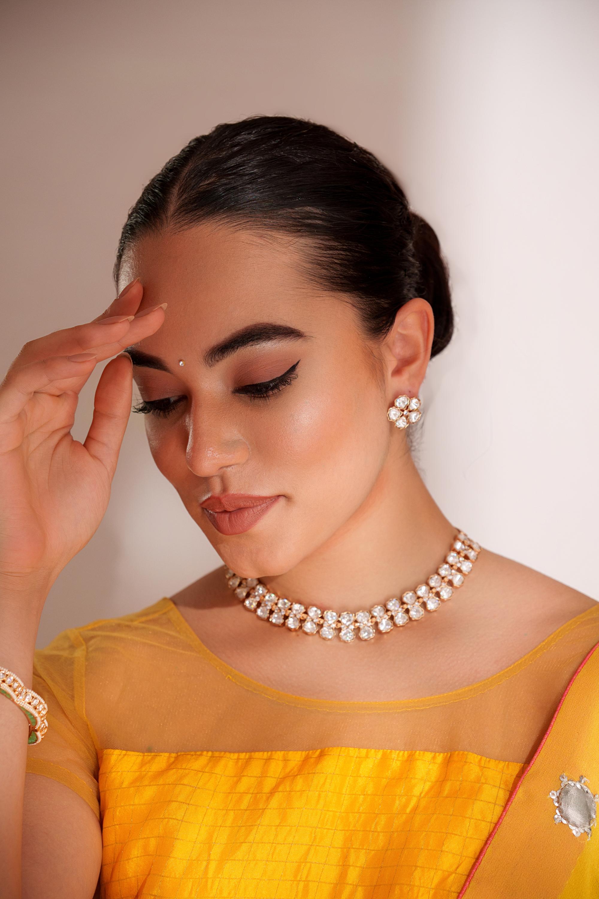 Elegant and stylish gold finish kundan polki necklace set