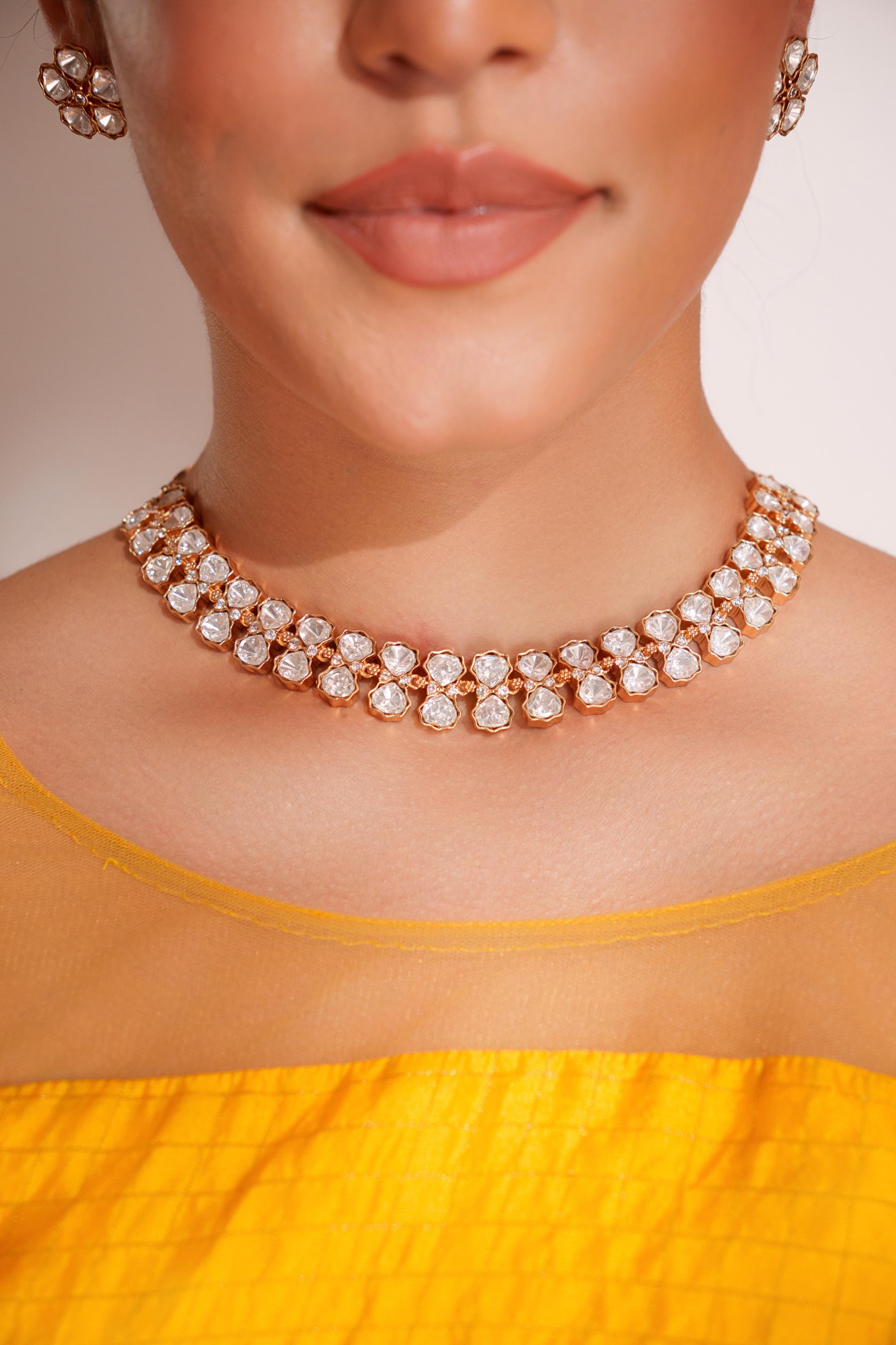 Elegant and stylish gold finish kundan polki necklace set