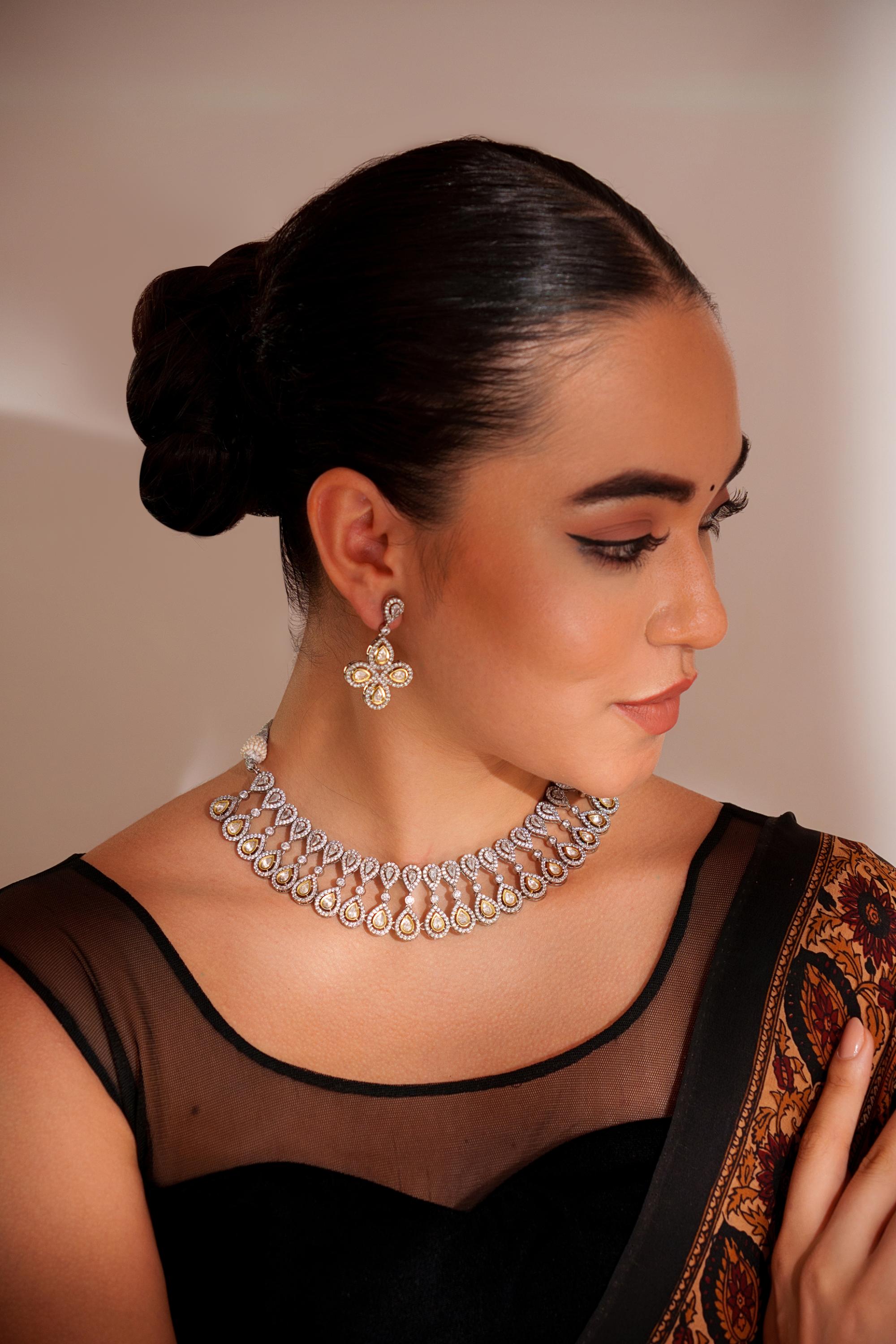 Dramatic and stylish zircon stone necklace set with matching earrings