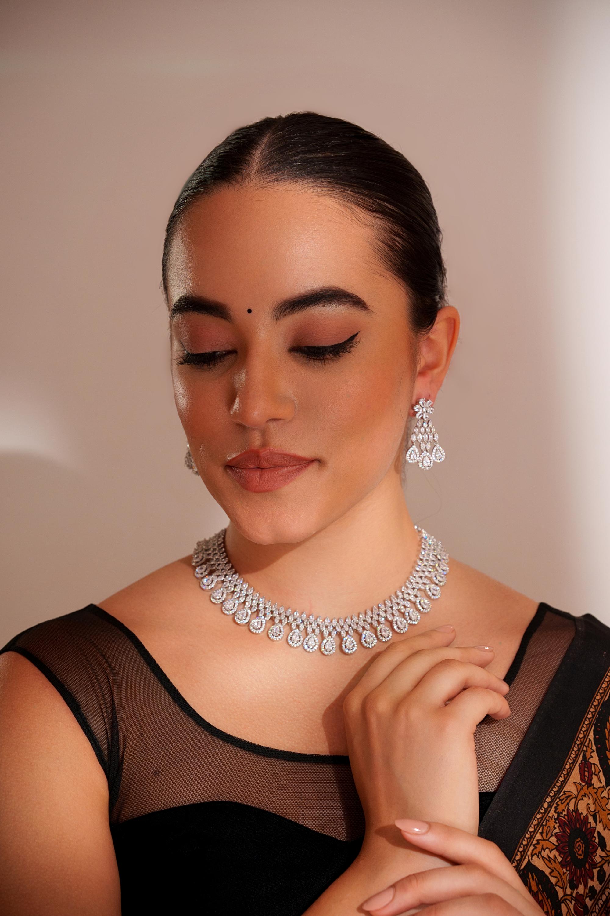 Elegant and stylish diamond necklace set with matching earrings
