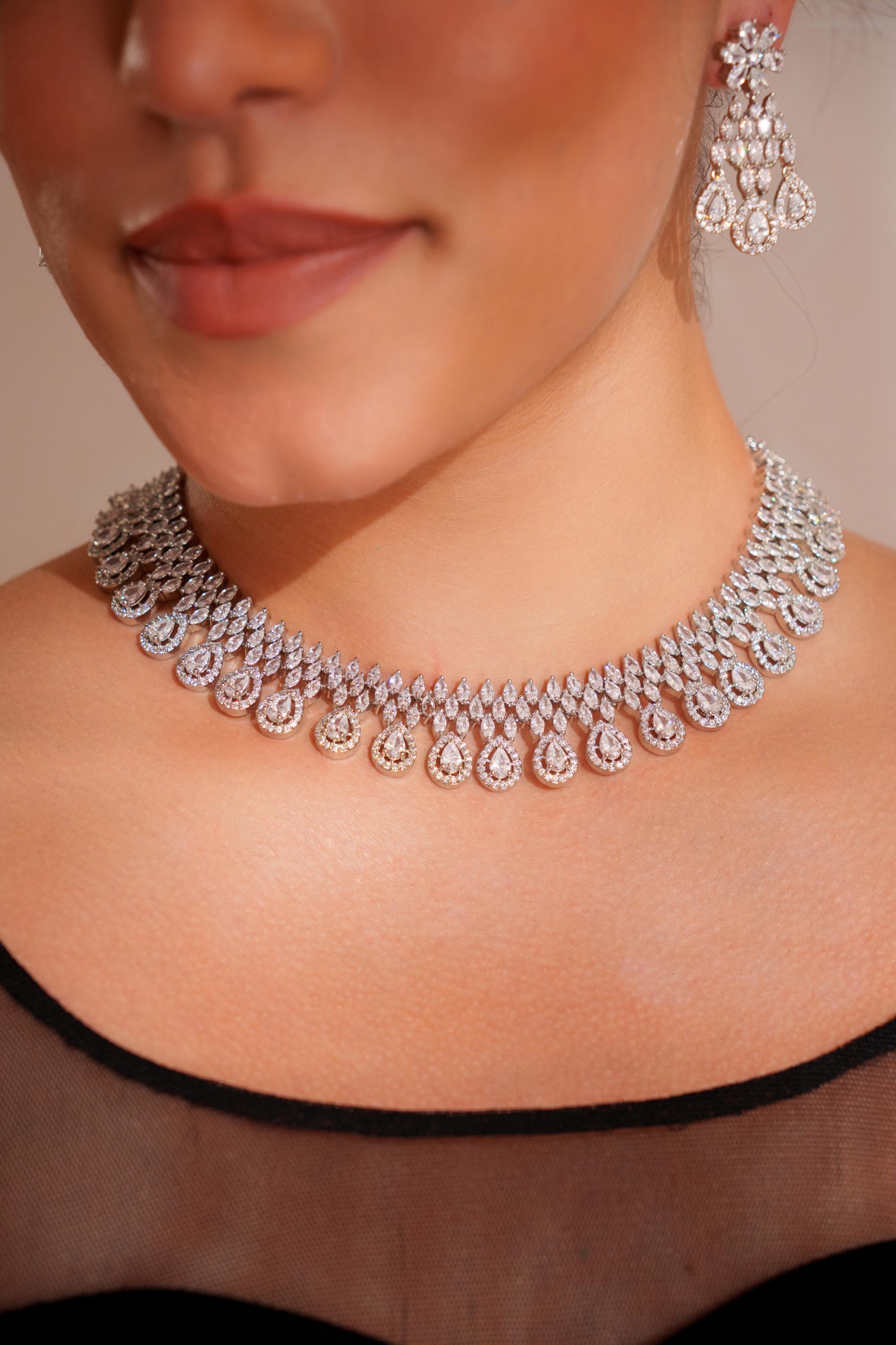 Elegant and stylish diamond necklace set with matching earrings