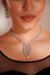 Elegant and sleek diamond pendant set with earrings